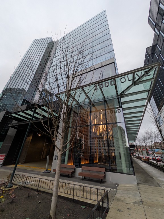 The lobby of Washington 1000 — 546,000 square feet of Class A office space, completed 2023, still seeking tenants. March 19, 2026.
