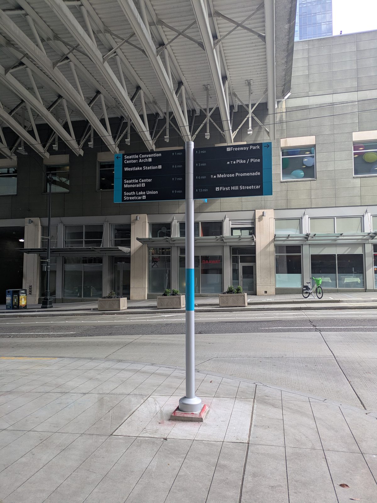 Both panels of the kiosk — entries pointing up Pike and down